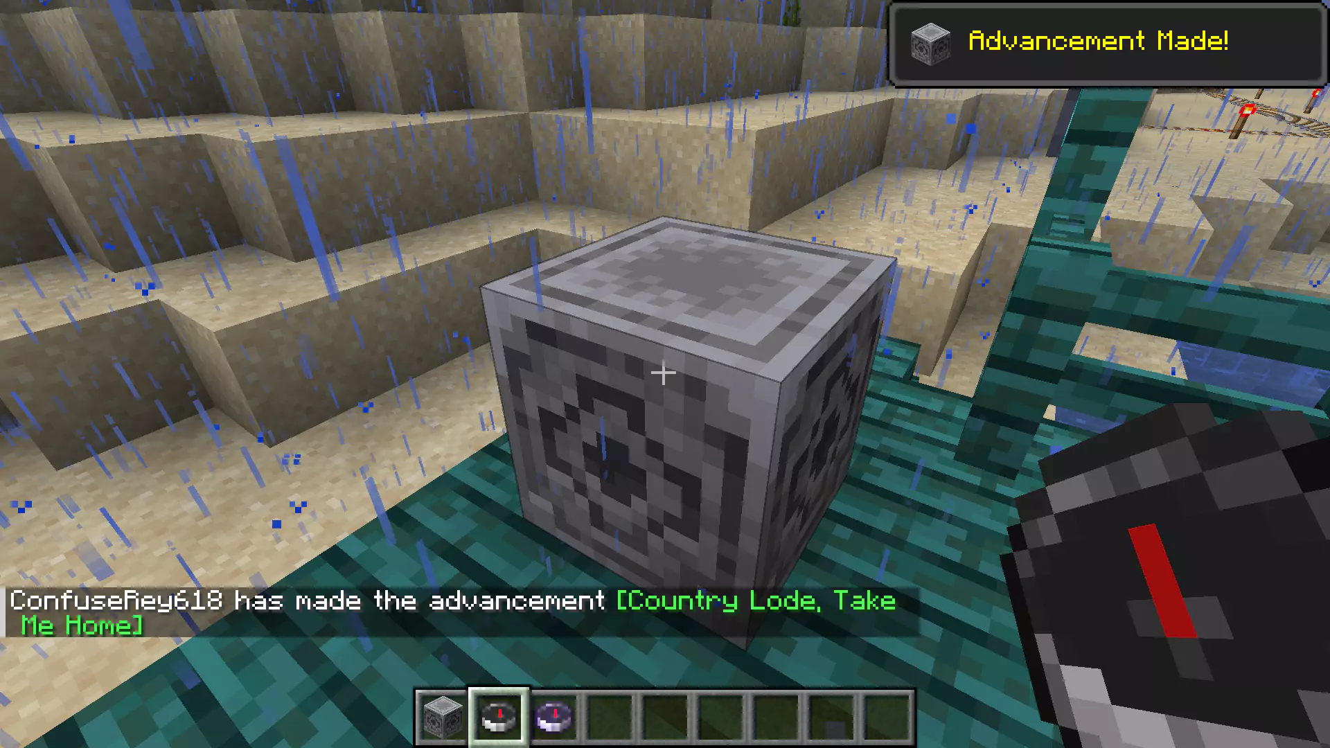 A player connecting a Compass to a Lodestone in Minecraft.