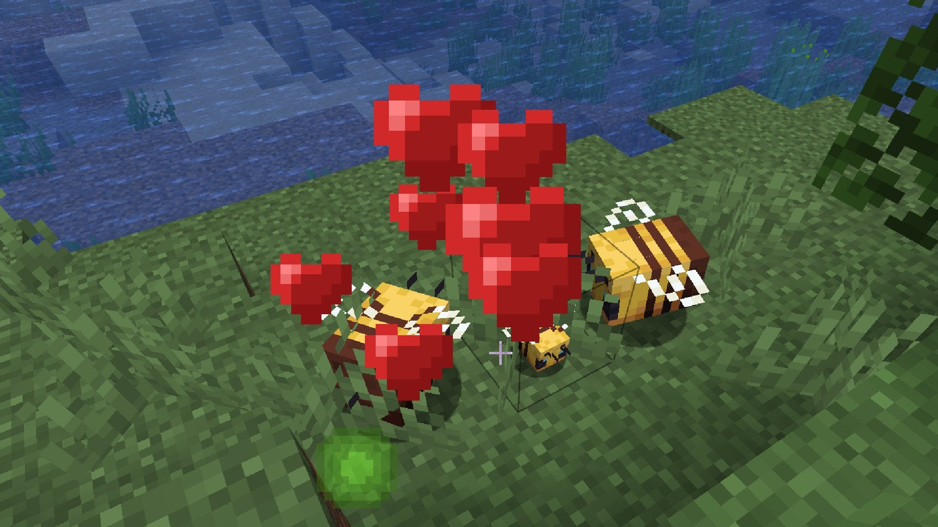 Two adult Bees and a Baby Bee with red heart particles surrounding them in Minecraft.